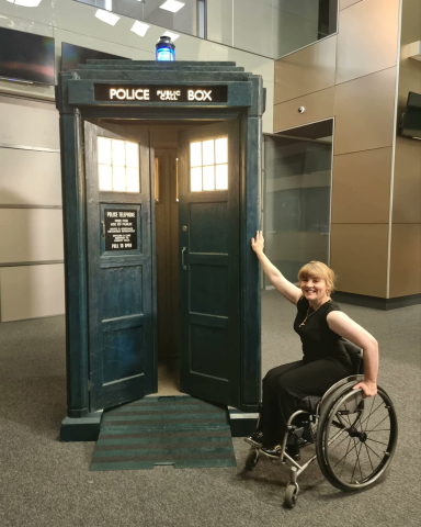 Gratuitous Dr Who still, featuring the new accessible Tardis with small ramp, featuring the actor Ruth Madeley in a wheelchair.